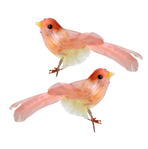 Pájaro de plumas volador color rosa