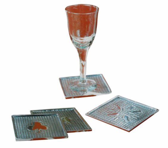 Set de cuatro posavasos de aluminio