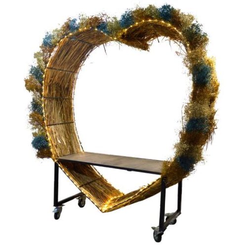 Corazón de photocall con ruedas y bloom