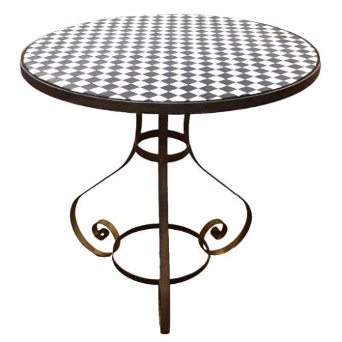 Mesa redonda de cuadros y patas cobrizas